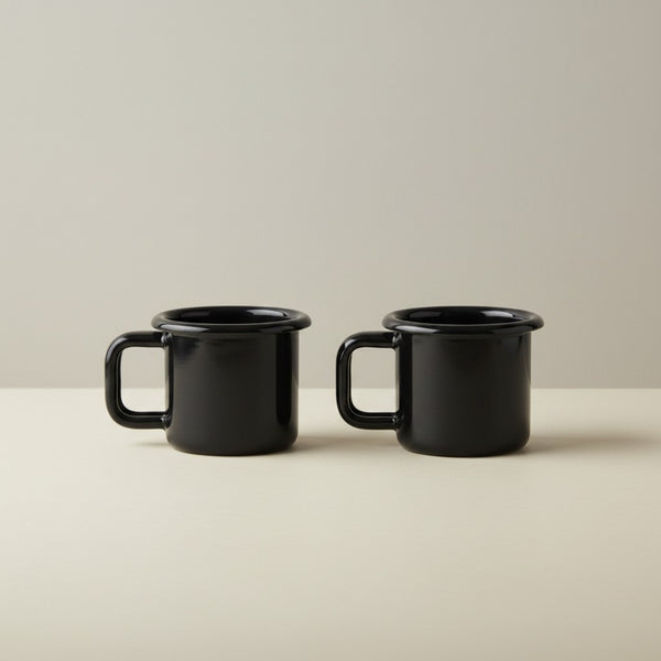 Vaisselle Emaillée set of 2 black enamel espresso cups, 100ml capacity, perfect for camping or retro kitchen style.