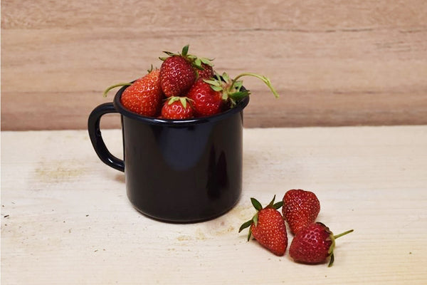 Vaisselle Emaillée black enamel mug, 250ml, perfect for cold drinks or as a serving dish.