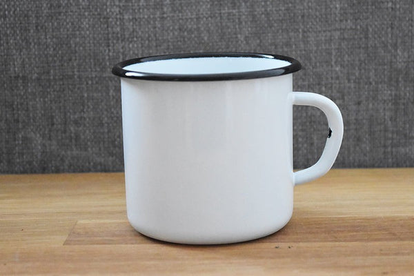 Vaisselle Emaillée white enamel mug with black rim, 250ml, set of 2. Durable metal for hot or cold drinks.