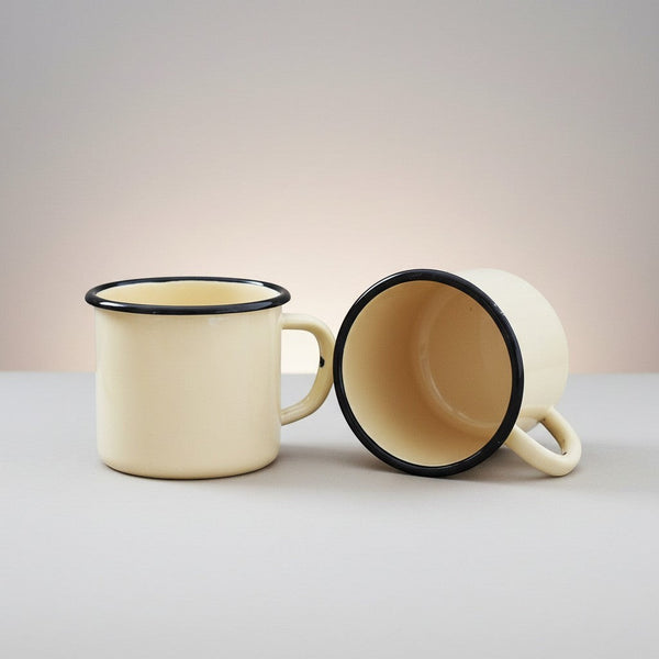 Vaisselle Emaillée set of 2 yellow enamel metal mugs with black rim, 250ml capacity, ideal for camping or rustic kitchenware.